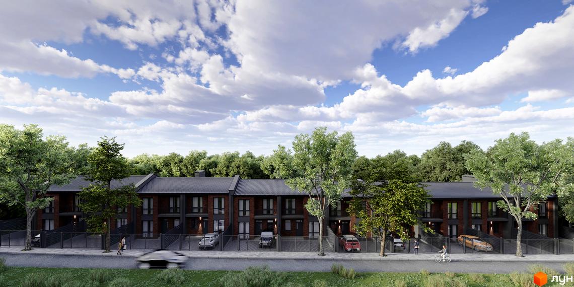 Зображення таунхаусів B-Hills з червоної цегли з сірими дахами та зеленими насадженнями. Перед будинками припарковані автомобілі.