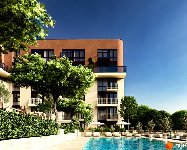Багатоповерховий будинок ЖК ЛАЙТ ПАРК з коричневим верхнім ярусом та світлими фасадами. На території басейн та багато зелених дерев.