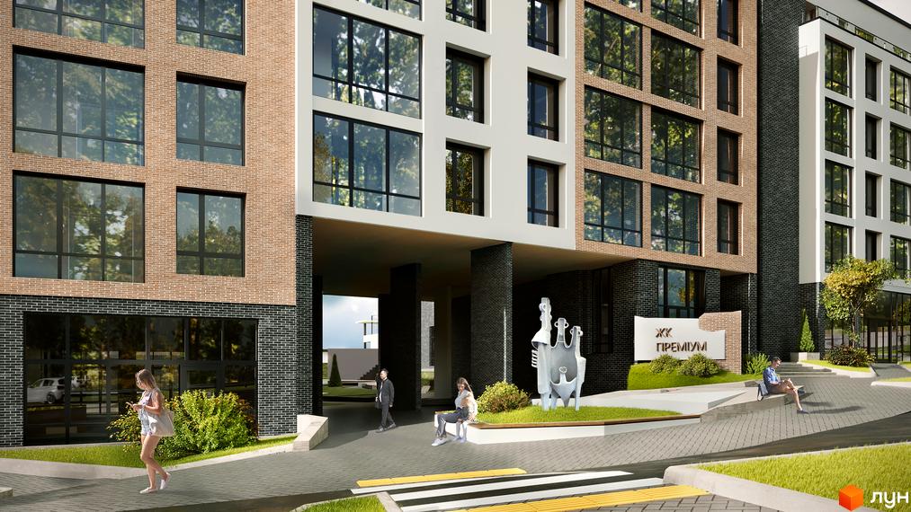 Житловий комплекс Масив Преміум з комбінованим цегляним фасадом та панорамними вікнами. Облаштована прибудинкова територія з озелененням.