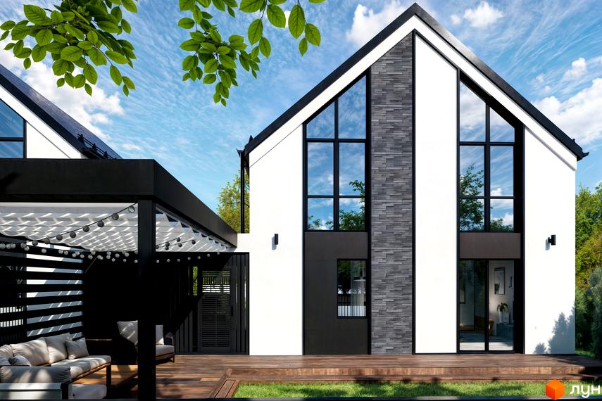 Котеджне містечко DESNA HOMES: білий двоповерховий будинок з великими вікнами та сірою кам'яною обробкою, тераса з диваном та гірляндами.