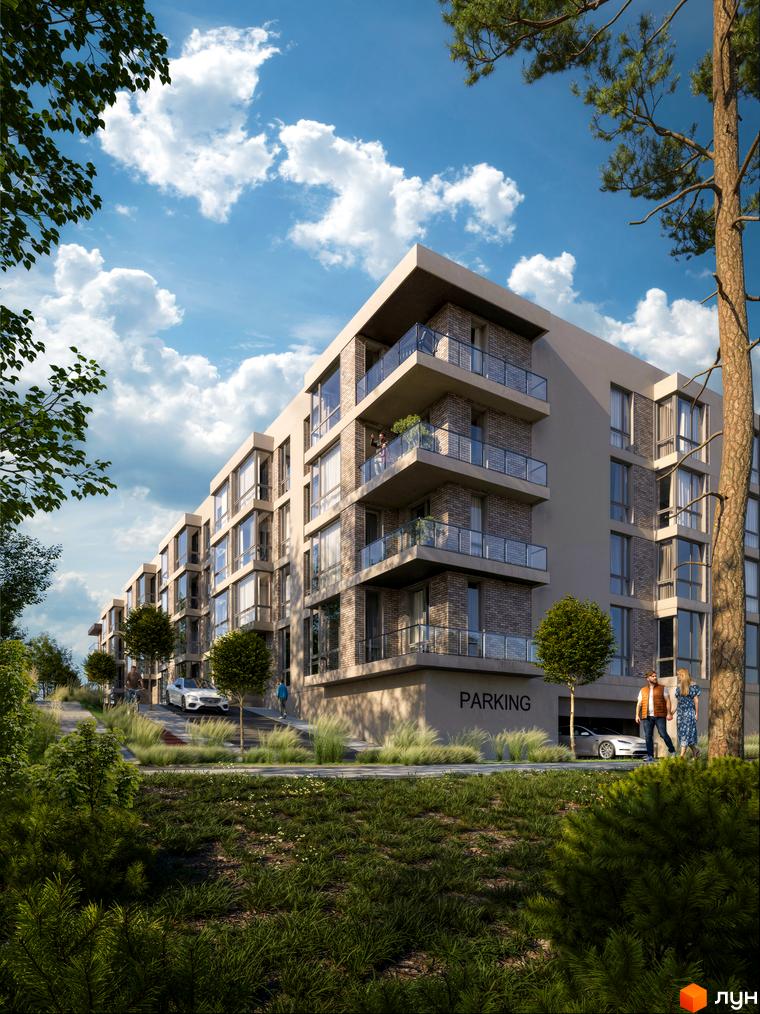 Житловий комплекс HILLTOP з цегляним фасадом та скляними балконами, оточений зеленою прибудинковою територією.