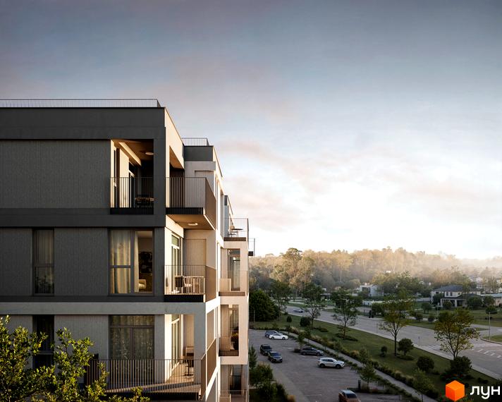 Житловий комплекс Avalon Magnolia з багаторівневим фасадом та балконами. Поруч видно парковку, дорогу та зелені насадження.