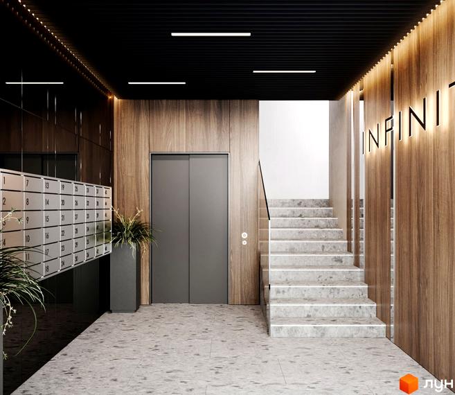 Інтер'єр холу житлового комплексу INFINITY з дерев'яними панелями, сходами та поштовими скриньками. Просторий хол з рослинами та ліфтом.