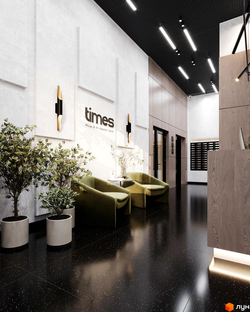 Інтер'єр апарт-комплексу Times з чорною підлогою, зеленими кріслами та рослинами у білих горщиках. На стіні логотип комплексу.
