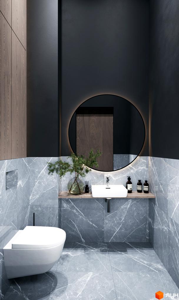 Інтер'єр ванної кімнати в Житловому комплексі Times з мармуровою плиткою та круглим дзеркалом з підсвічуванням.