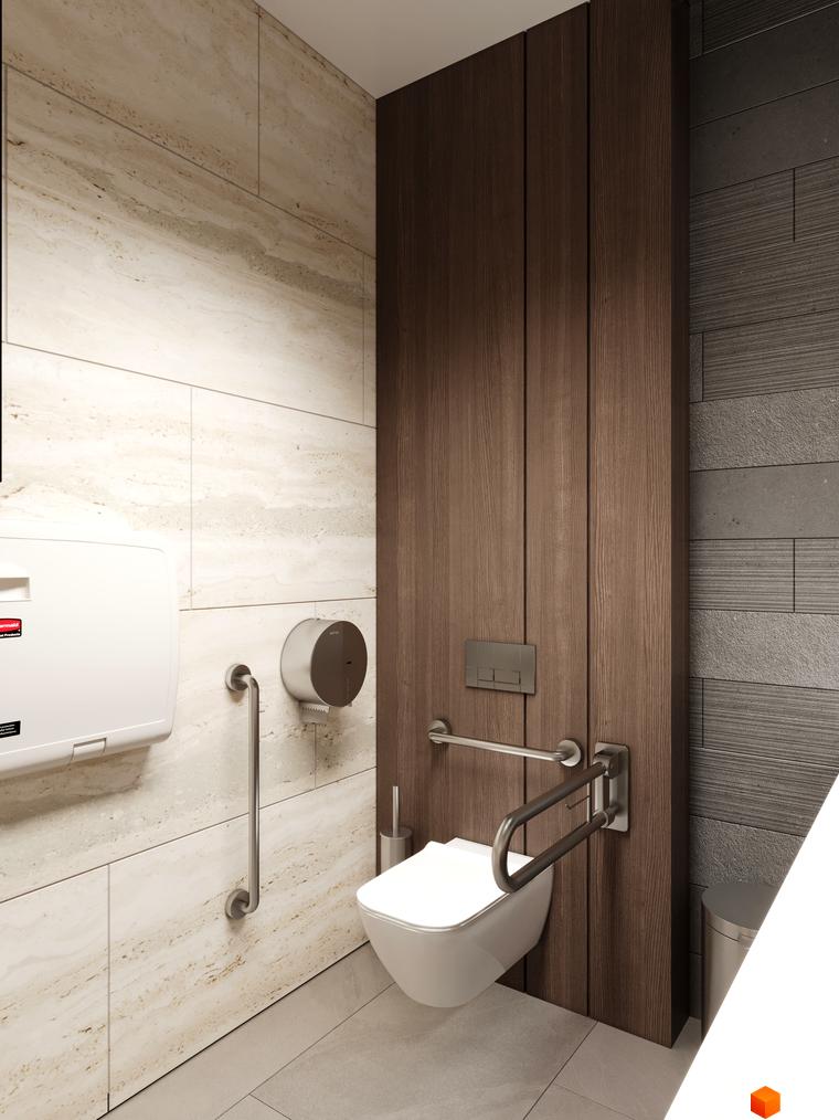 Інтер'єр туалетної кімнати з унітазом, поручнями для людей з інвалідністю та пеленальним столиком. Оздоблення стін виконано з плитки під камінь.