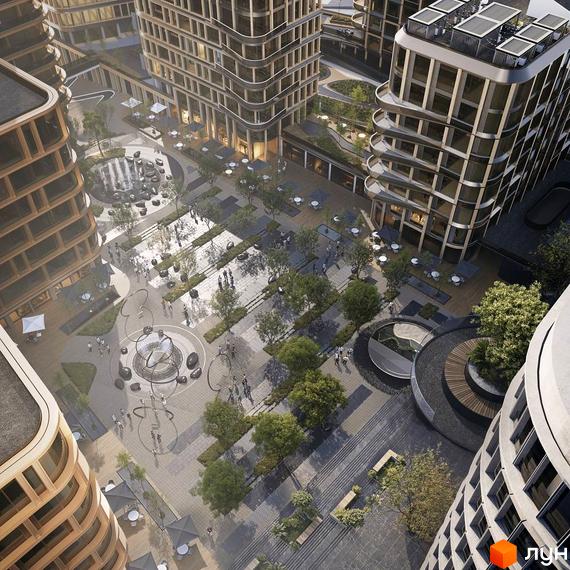 Будівлі LVIV CITY мають вигнуті фасади та багато вікон. Прибудинкова територія включає площі з деревами, фонтанами та місцями для відпочинку.