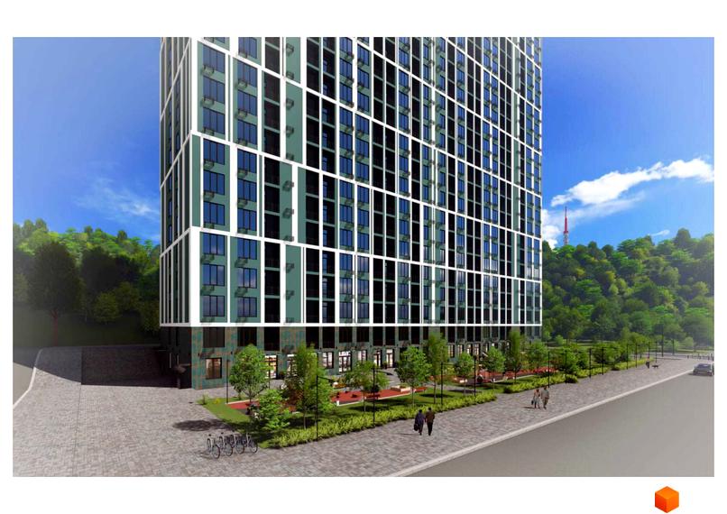 Новобудова ЖК Orange City з фасадом з вікон та балконів. На прибудинковій території розташовані дерева, лавки та доріжки для пішоходів.