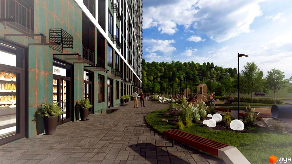 Житловий комплекс Orange City з фасадом із зелених металевих панелей та прибудинковою територією з дитячим майданчиком та зонами відпочинку.