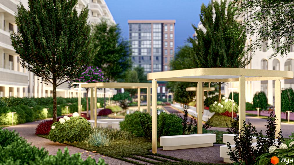 Житловий комплекс RESIDENTS AVENUE: зелена прибудинкова територія з альтанками та лавками. Сучасна архітектура житлових будинків.