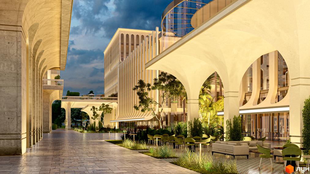 Житловий комплекс RESIDENTS AVENUE з аркадами та затишною терасою. Зовнішній вигляд новобудови з елементами класичної архітектури та зеленою зоною для відпочинку.