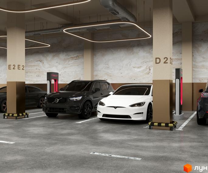 Сучасний паркінг житлового комплексу RESIDENTS AVENUE з електромобілями та зарядними станціями Tesla. Зручні місця для паркування та зарядки вашого авто.