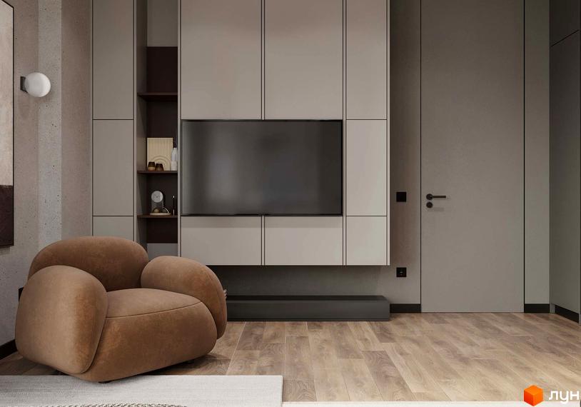 Інтер'єр кімнати з телевізором та м'яким кріслом. На підлозі паркет, стіни світлі.