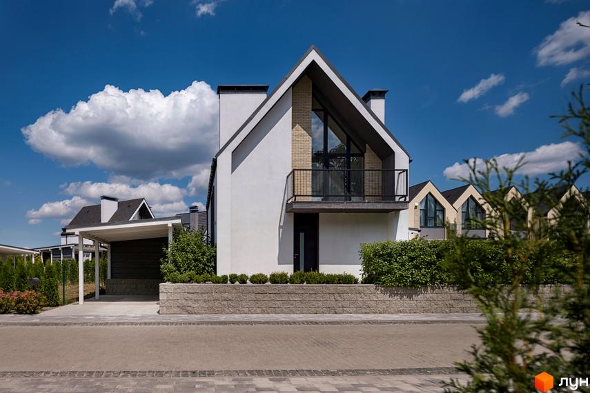 Котеджне містечко КМ VILLAGGO. Сучасні будинки з панорамними вікнами та доглянутою прибудинковою територією.