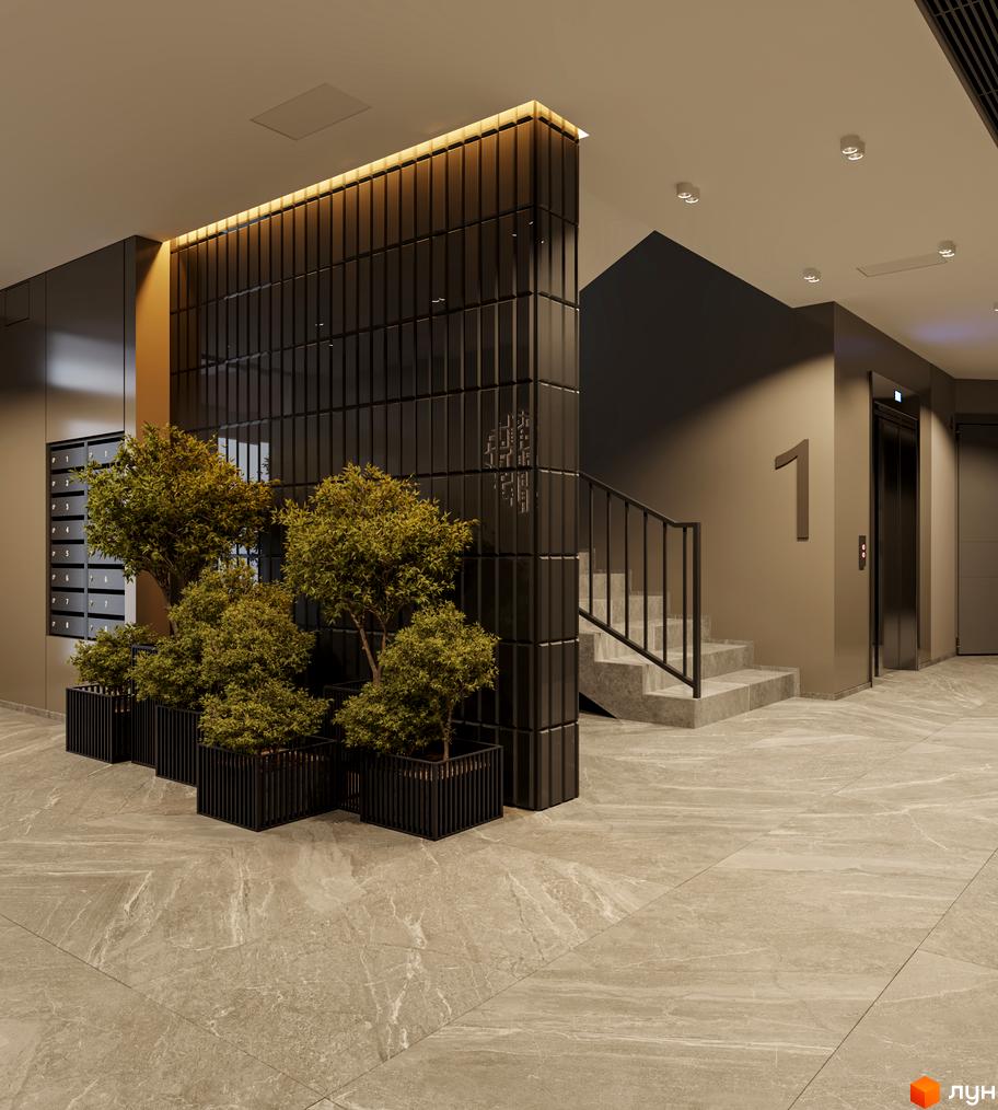 Сучасний хол житлового комплексу з ліфтом, сходами та рослинами у горщиках. Відкрийте для себе комфортне життя на вулиці Лікарській, 12.