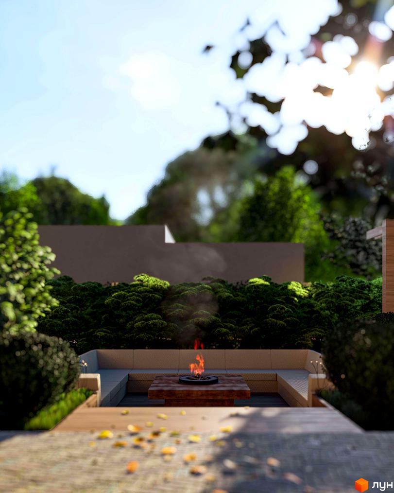 Вигляд на будівлю Житлового комплексу Минай та облаштовану зону відпочинку з вогнищем і зеленими насадженнями.