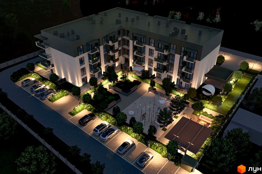 Житловий комплекс Минай вночі: багатоповерховий будинок з балконами та освітлена прибудинкова територія з паркінгом, дитячим майданчиком та зеленими насадженнями.