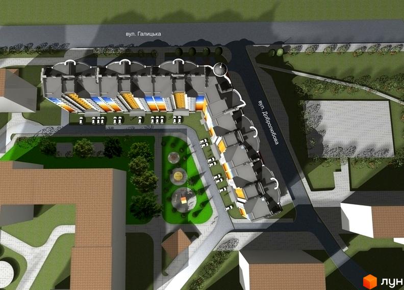 Вигляд зверху на Новобудову по вул. Галицька, 120а. На фото будівля з прибудинковою територією, дитячим майданчиком та парковкою.