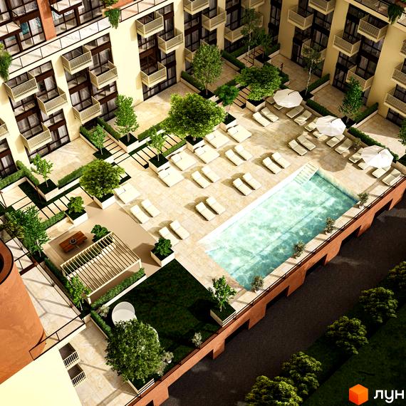 Житловий комплекс ЛАЙТ ПАРК: вид зверху на багатоквартирні будинки з бежевими фасадами та внутрішній двір з басейном, шезлонгами та зеленими насадженнями.