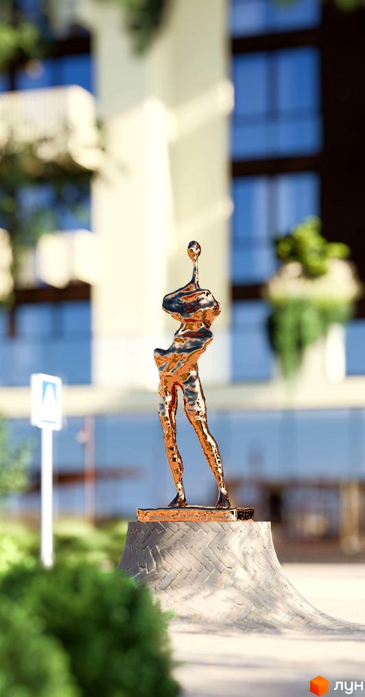 Будівля Житлового комплексу ЛАЙТ ПАРК з великими вікнами, що оточена зеленню. Перед нею розміщено золоту скульптуру на постаменті.