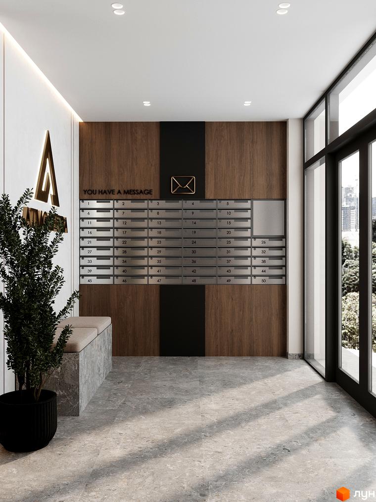 Сучасний вхід до житлового комплексу ATMOSFERA з індивідуальними поштовими скриньками та зоною відпочинку. Великі вікна виходять на зелену зону.