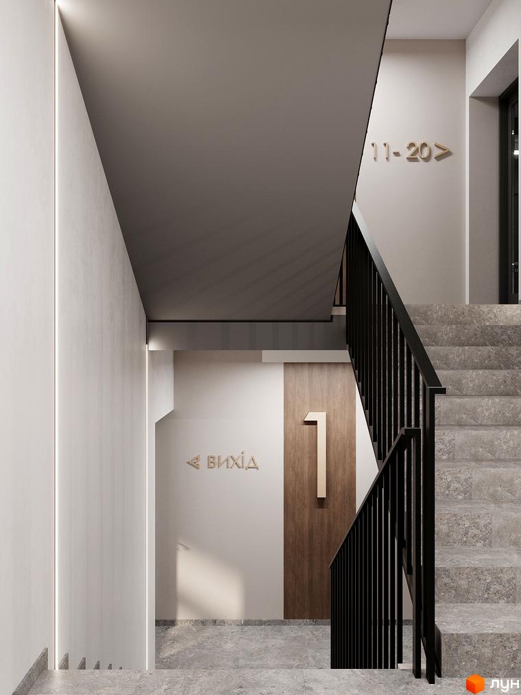Сучасний інтер'єр сходової клітини в ЖК ATMOSFERA з мармуровими сходами та стильним освітленням. На стіні вказівник напрямку руху та номер поверху.