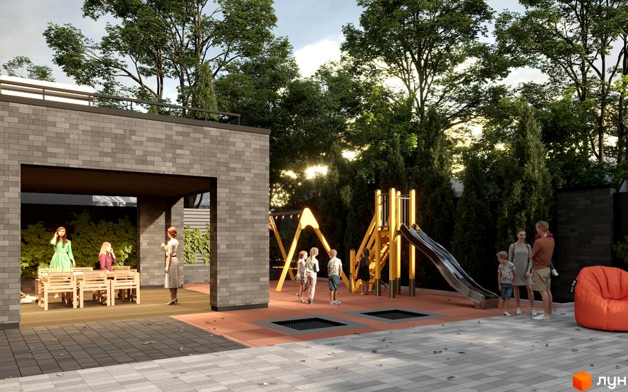 Житловий комплекс Family Space. Дитячий майданчик з гіркою та батутами, зоною відпочинку з альтанкою та столами.