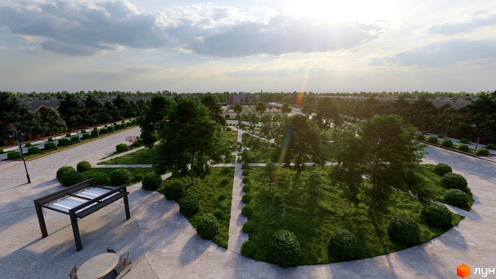 Зображення Котеджного містечка Beverly Hills Town з великою зеленою територією та ландшафтним дизайном. Вигляд зверху на алеї та дерева.
