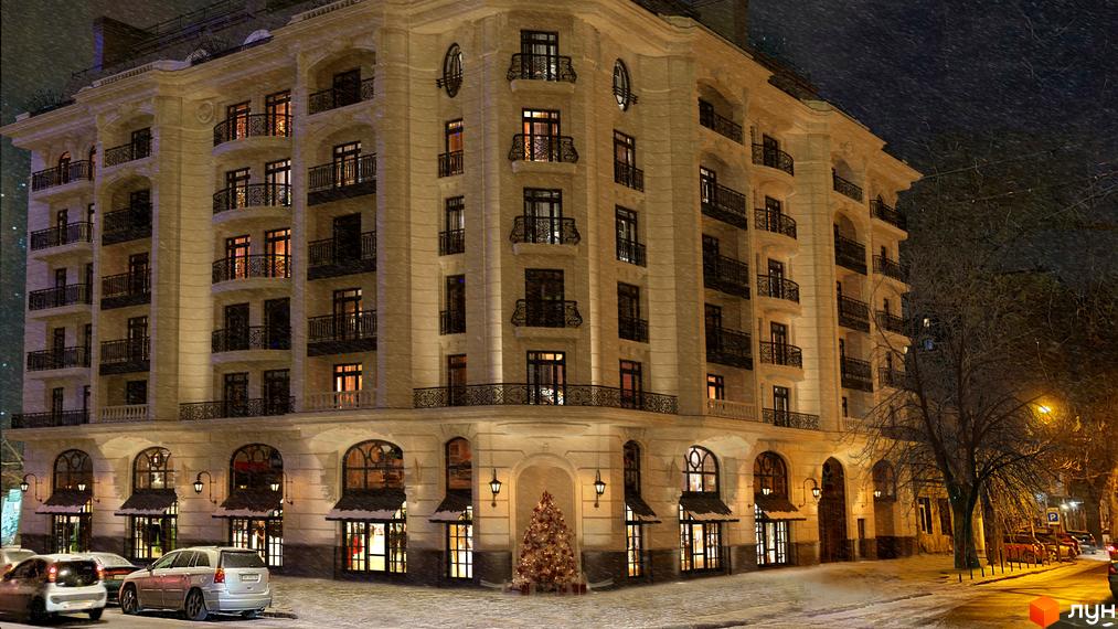 Зовнішній вигляд житлового комплексу Гімназист взимку. Будинок має класичну архітектуру з балконами та великими вікнами. Перед будівлею встановлена ялинка.