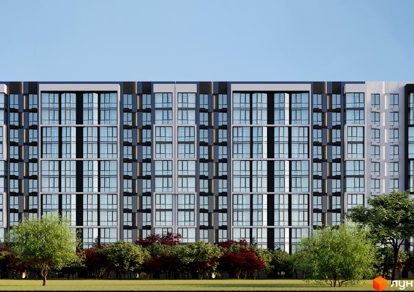 Фасад житлового комплексу Аристократ з численними вікнами та зеленою зоною навколо. Будівельний проєкт Аристократ має багатоповерхові секції з панорамним склінням.