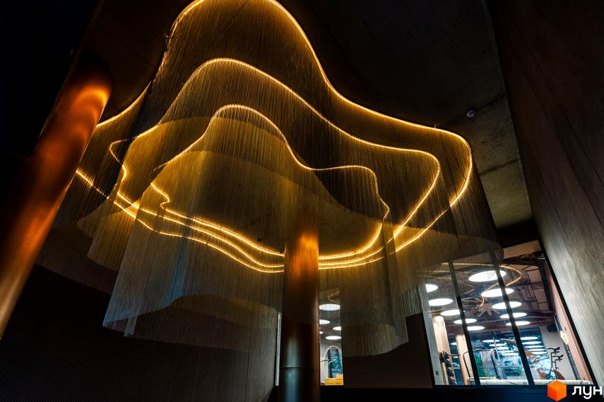 Житловий комплекс Avalon Prime. Інтер'єр з унікальною підвісною конструкцією та освітленням.