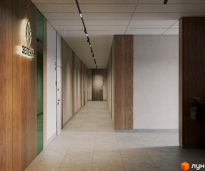 Коридор в ЖК Зелений з оздобленням з дерева та світлими стінами. На стіні вивіска з назвою житлового комплексу.