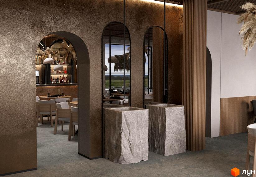 Інтер'єр ресторану в Апарт-комплексі „Меланіт Резорт & СПА“ з арковими проходами, дзеркалами та кам'яними колонами, що створюють атмосферу затишку.