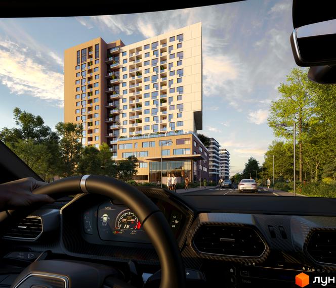 Житловий комплекс AUROOM AIR з багатоповерховими будинками та зеленою прибудинковою територією. Вид з салону автомобіля.