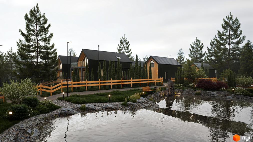 Котеджне містечко Схили з чорними фасадами та дерев'яними акцентами, оточене соснами та водоймою з кам'янистим берегом.