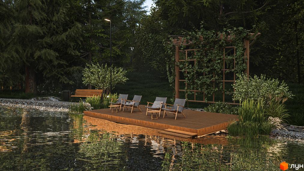 Котеджне містечко КМ Схили. Зона відпочинку біля води з дерев'яною терасою, кріслами та перголою з ліанами.