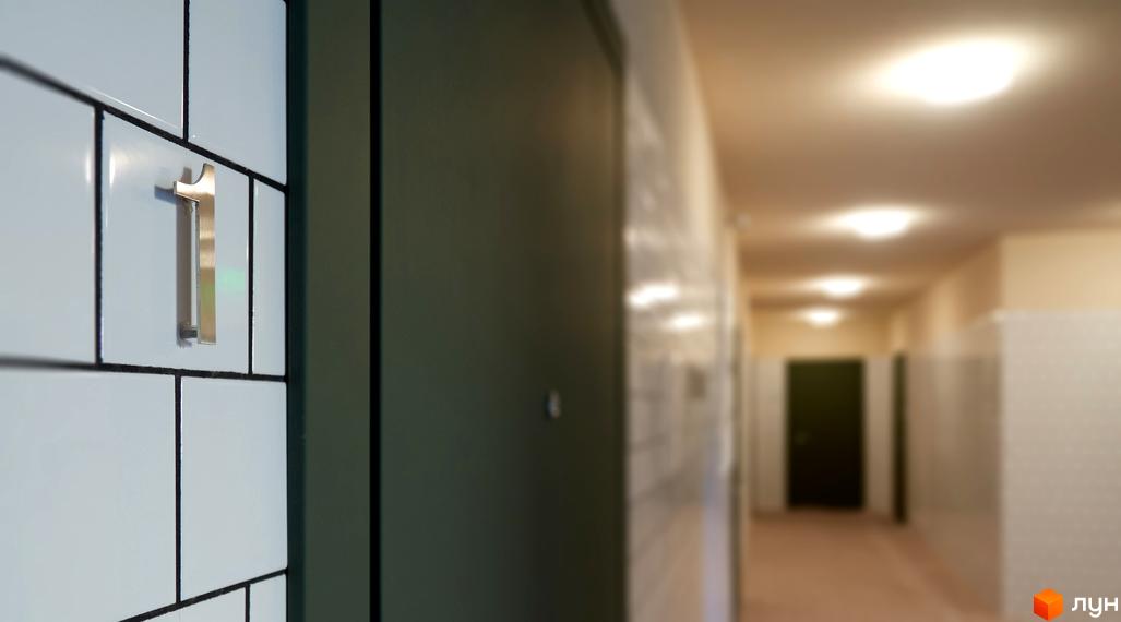 Внутрішній коридор житлового комплексу Будинок на Вавилових з нумерацією квартир та освітленням.