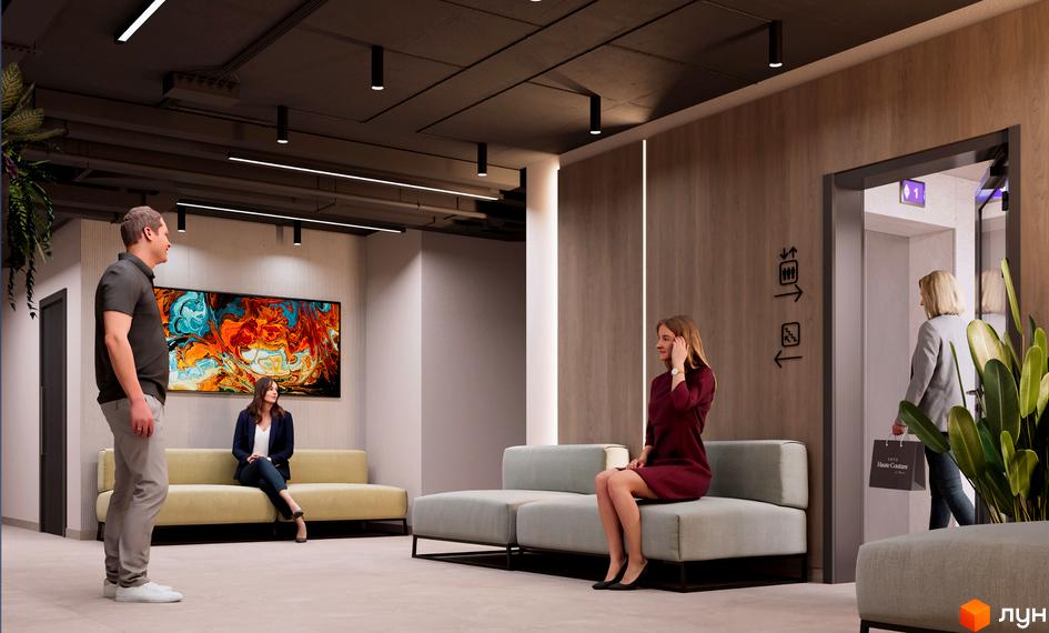 Інтер'єр вестибюлю Житлового комплексу NAGIRNIY HOUSE з м'якими диванами, ліфтом та великою картиною на стіні.