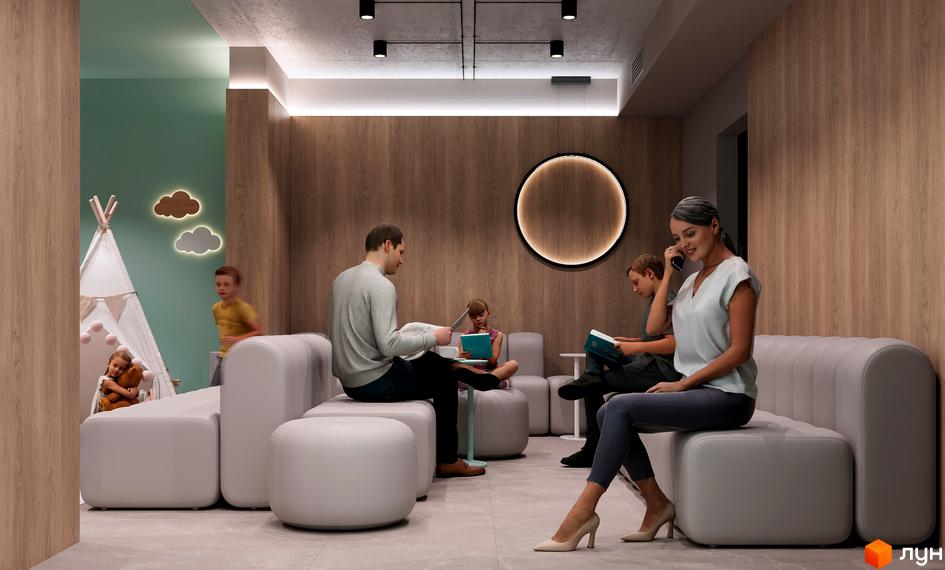 Зображення зони очікування в Житловому комплексі NAGIRNIY HOUSE. Інтер'єр з м'якими меблями та дітьми, що граються.