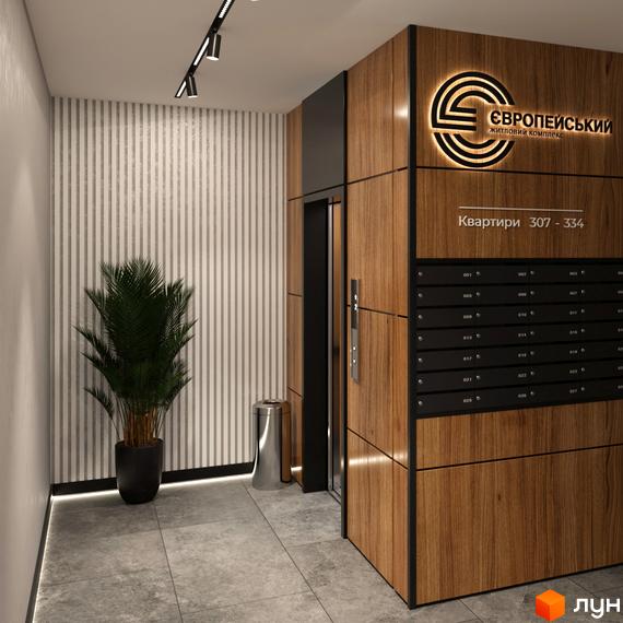 Інтер'єр холу Житлового комплексу Європейський з поштовими скриньками та ліфтом. На стіні логотип комплексу та номери квартир.