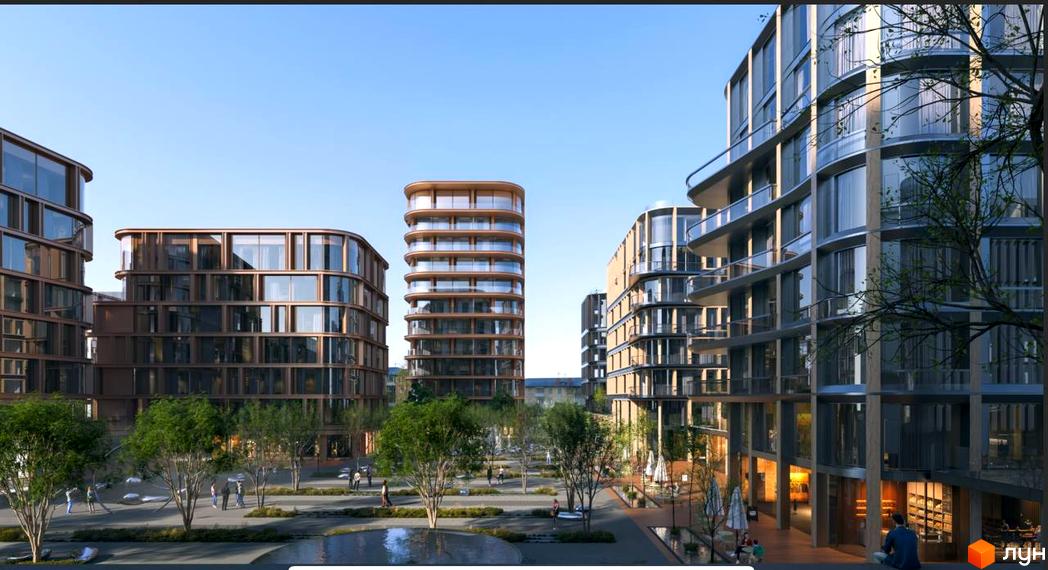 Зовнішній вигляд житлового комплексу LVIV CITY з вигнутими фасадами та скляними балконами. На прибудинковій території зелені насадження та зона відпочинку.