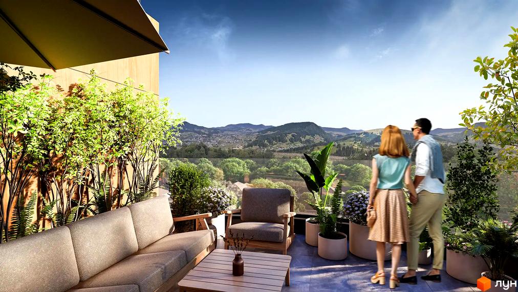 Житловий комплекс FREEDOM з терасою та видом на гори. На терасі розташовані диван, крісло, столик та зелені рослини, а пара насолоджується краєвидом.