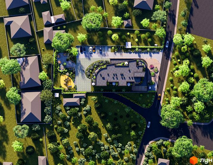 Вид зверху на житловий комплекс FREEDOM з багатоповерховим будинком та прибудинковою територією з дитячим майданчиком та парковкою.