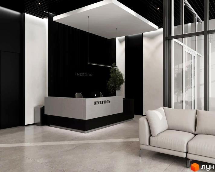 Сучасний інтер'єр рецепції житлового комплексу FREEDOM з диваном та рослиною. Офіс у новобудові.
