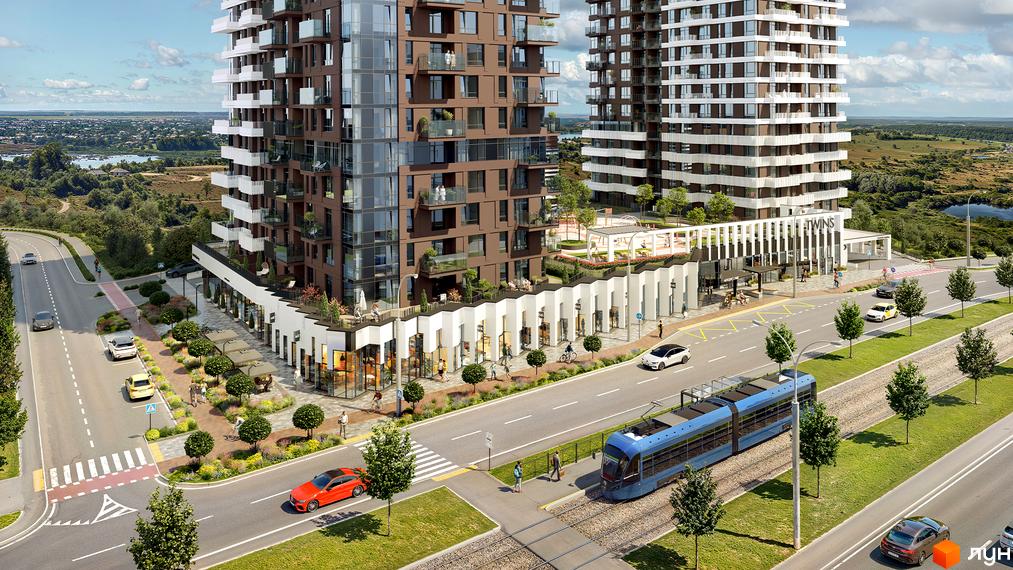 Житловий комплекс TWINS має дві висотні будівлі з коричневими та білими фасадами. Прибудинкова територія включає дороги, трамвайні колії, комерційні приміщення та озеленення.