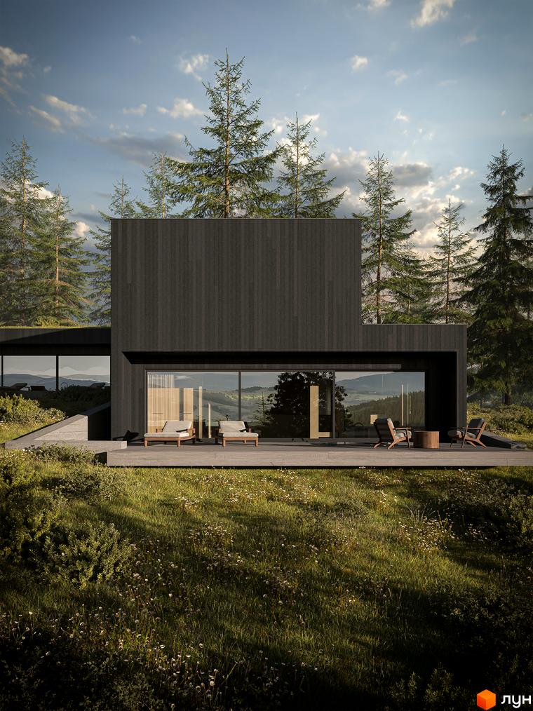 Будинок YUGEN invest з темними дерев'яними фасадами та великими вікнами, розташований серед сосен на схилі пагорба з терасою та вуличними меблями.