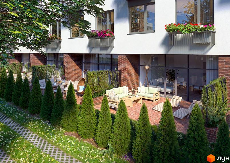 Зображення сторінки ЖК Олімпійський White. Білий будинок з балконами, прикрашеними квітами. На прибудинковій території висаджені туї, є зона відпочинку з меблями.