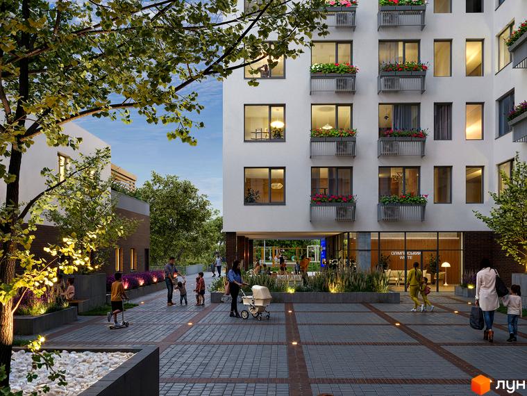 Зображення фасаду будинку житлового комплексу Олімпійський White з квітами на балконах та упорядкованою прибудинковою територією з пішохідними доріжками.