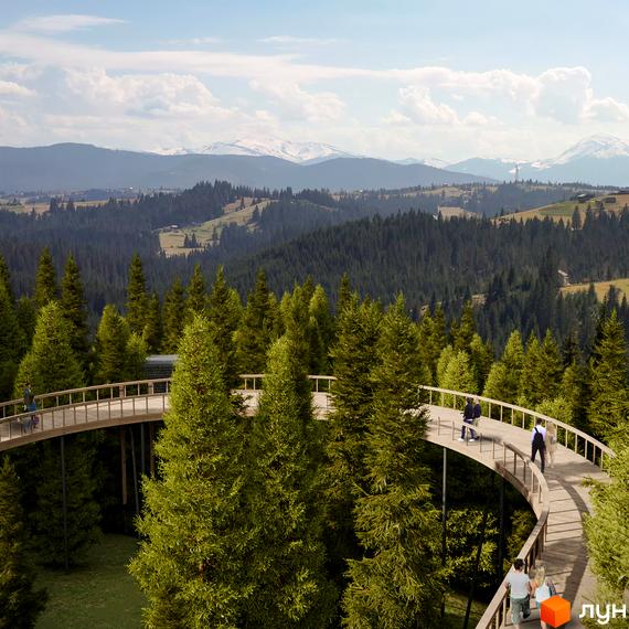 Оглядовий майданчик серед дерев у Котеджному містечку Dzen Residence. На фоні гірський пейзаж та хвойний ліс.