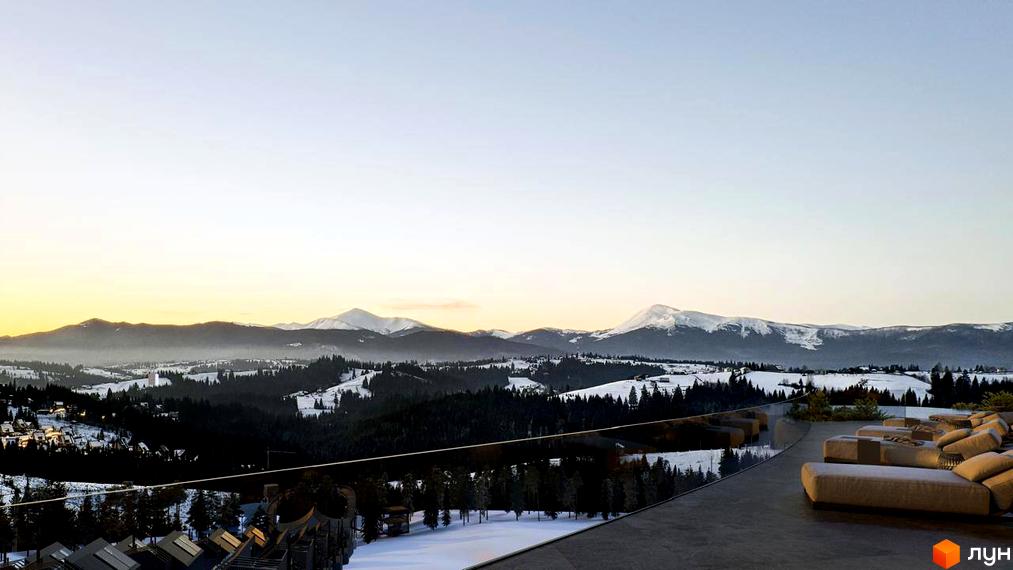 Вид на гори з тераси Котеджного містечка Dzen Residence. Зимовий пейзаж з засніженими горами та лісом.